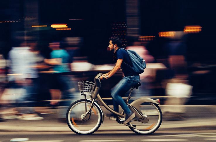 man riding bike
